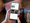 En hånd med en telefon, som viser inspirationsønskelister i MobilePay