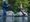 Two men fishing and talking to each other