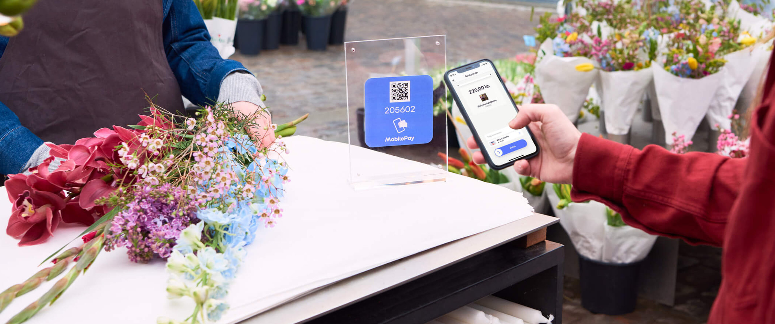 Billede som viser MobilePay-betaling hos en blomsterhandler.